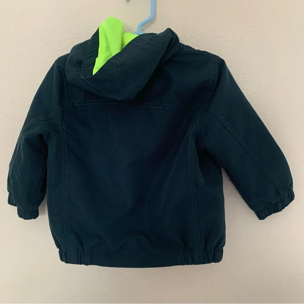 Kids Navy Blue Jacket with Neon Green Accents and zip in removable warm layer‎